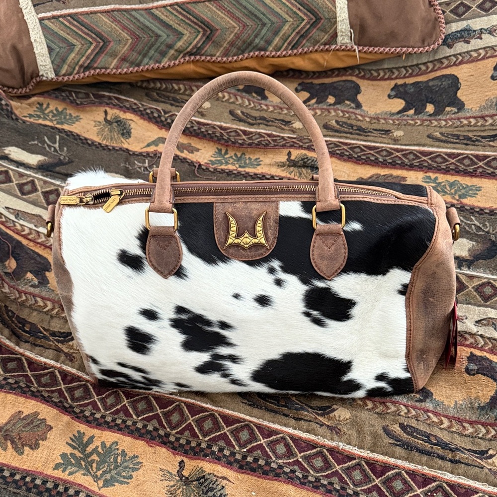 Cowhide duffle bag